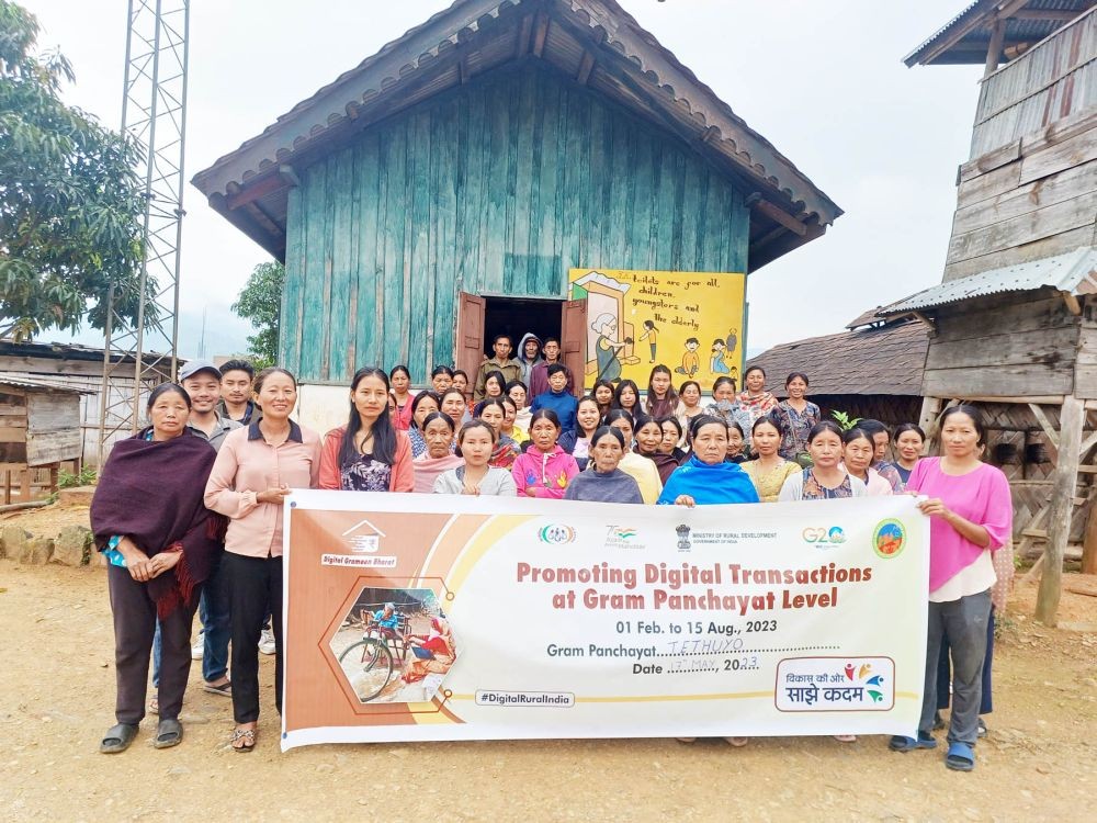 Participants with resource person during the Nagaland the launching programme of Promoting Digital Transaction at Gram Panchayat Level campaign at Tethuyo village under Longmatra Block on May 19.
